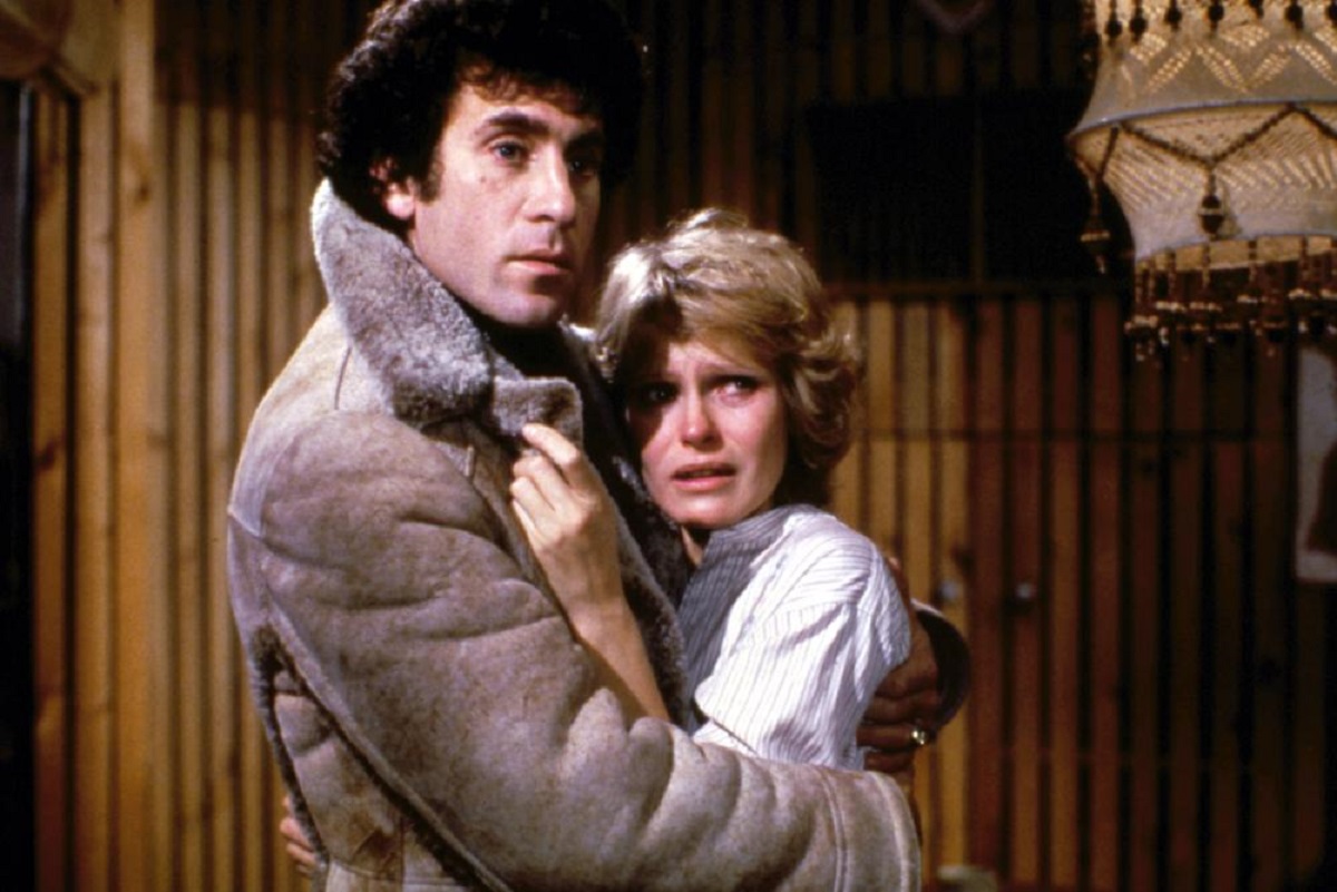 Psychiatrist Paul Michael Glaser comforts Susan Hogan as a killer eliminates the patients in his group in Phobia (1980)