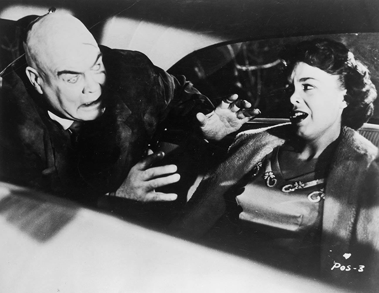 The zombified Tor Johnson advances on Mona McKinnon in Plan 9 from Outer Space (1959)