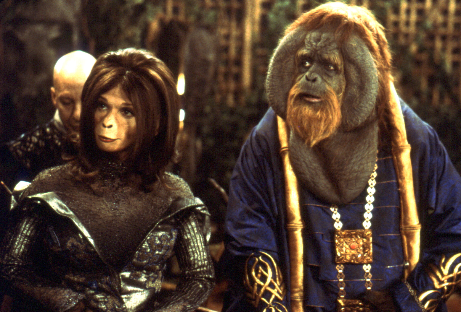 Ari (Helena Bonham Carter) and Senator Nado (Glenn Shadix) in Planet of the Apes (2001)