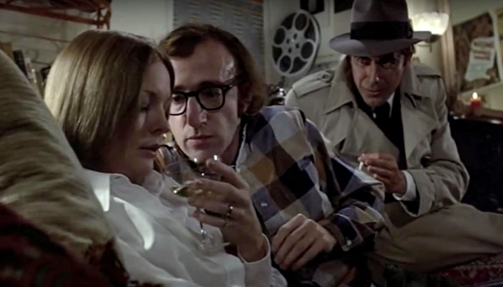 Woody Allen romances Diane Keaton as the ghost of Humphrey Bogart (Jerry Lacy) looks on in Play It Again Sam (1972)