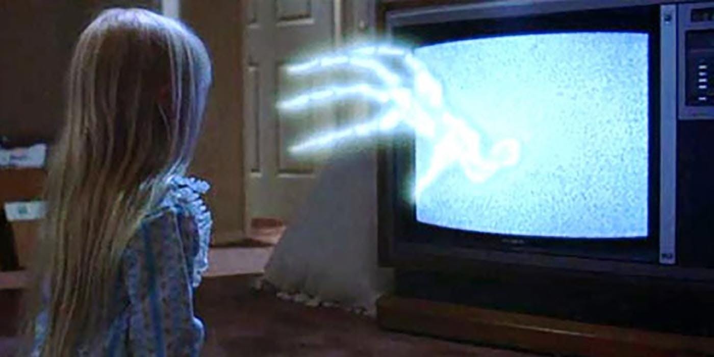 The tv reaches out to Carol Ann (Heather O’Rourke) in Poltergeist (1982)