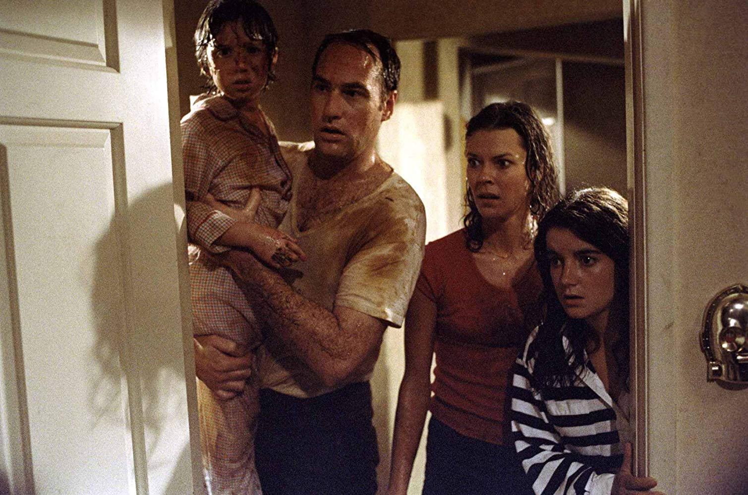 The Freeling family - (l to r) son Oliver Robbins, father Craig T. Nelson, mother JoBeth Williams and daughter Dominique Dunne in Poltergeist (1982)