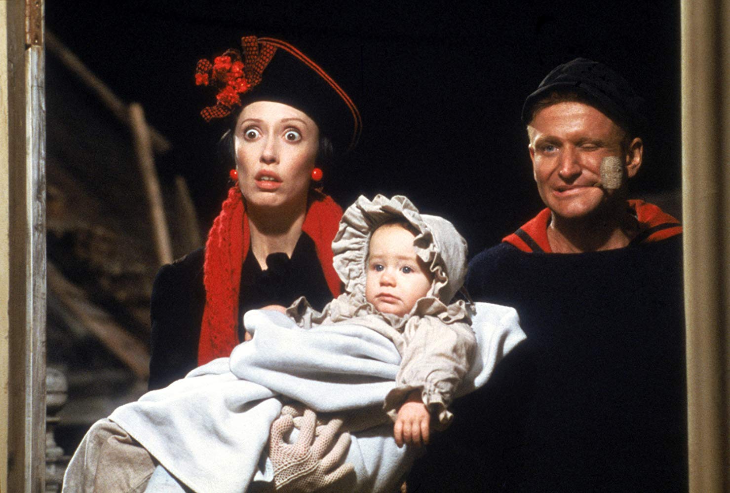 Olive Oyl (Shelley Duvall) and Popeye (Robin Williams) with baby Swee'pea (Wesley Ivan Hurt) in Popeye (1980)