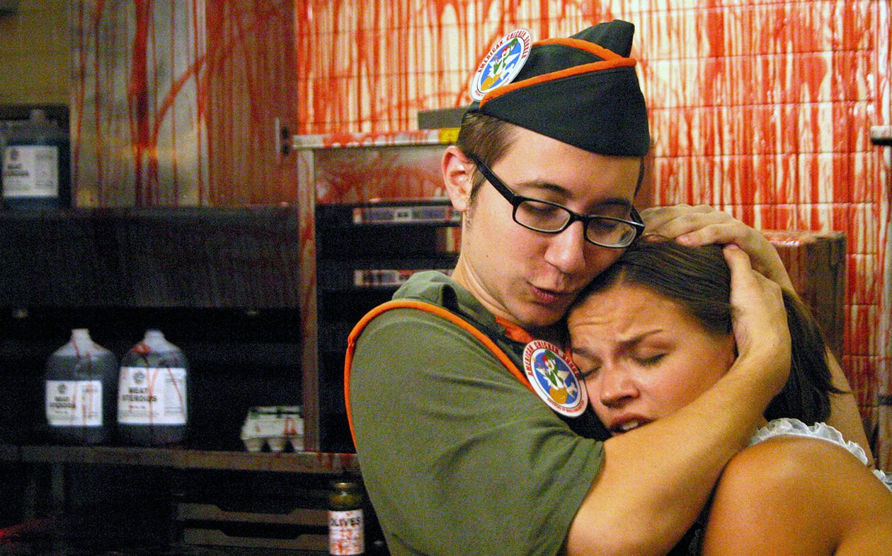 Jason Yachanin comforts Kate Graham in Poultrygeist Night of the Chicken Dead (2006)