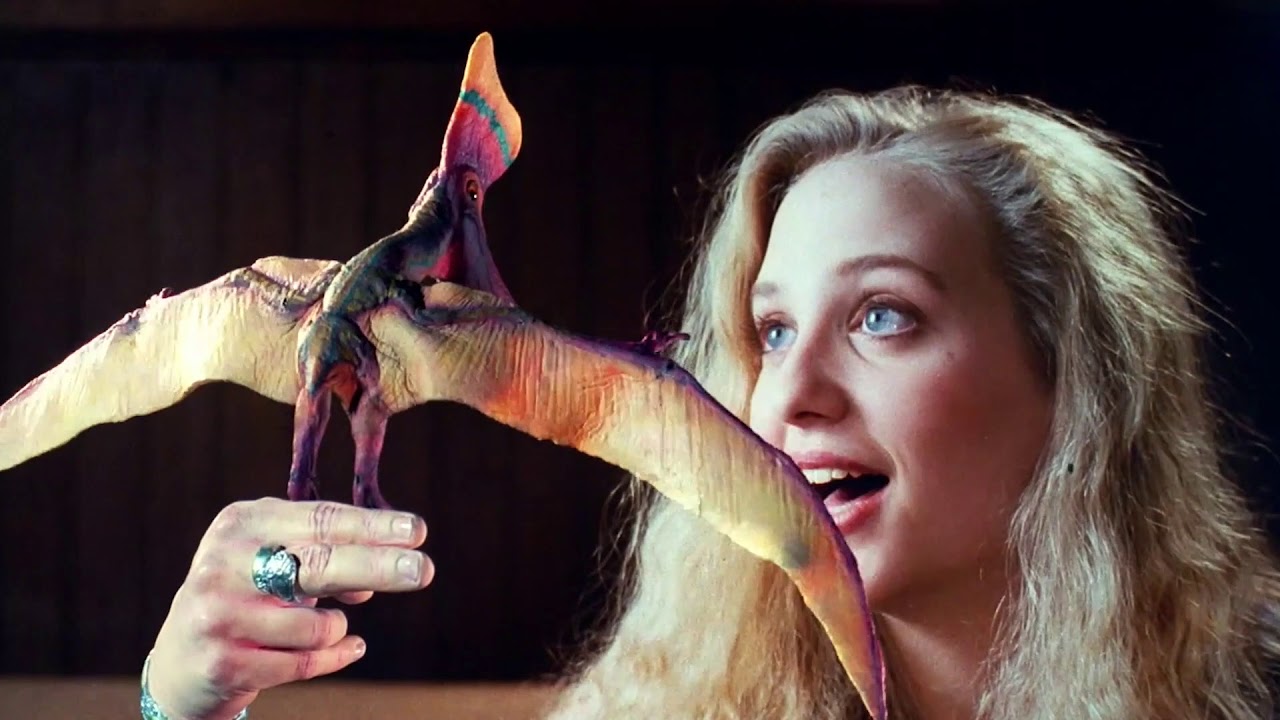 Samantha Mills and baby dinosaur in Prehysteria! (1993)