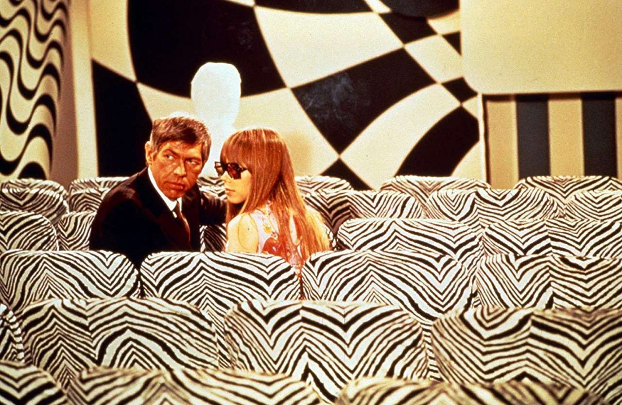 James Coburn and Joan Delaney on the run amid a host of conspiracies in The President's Analyst (1967)