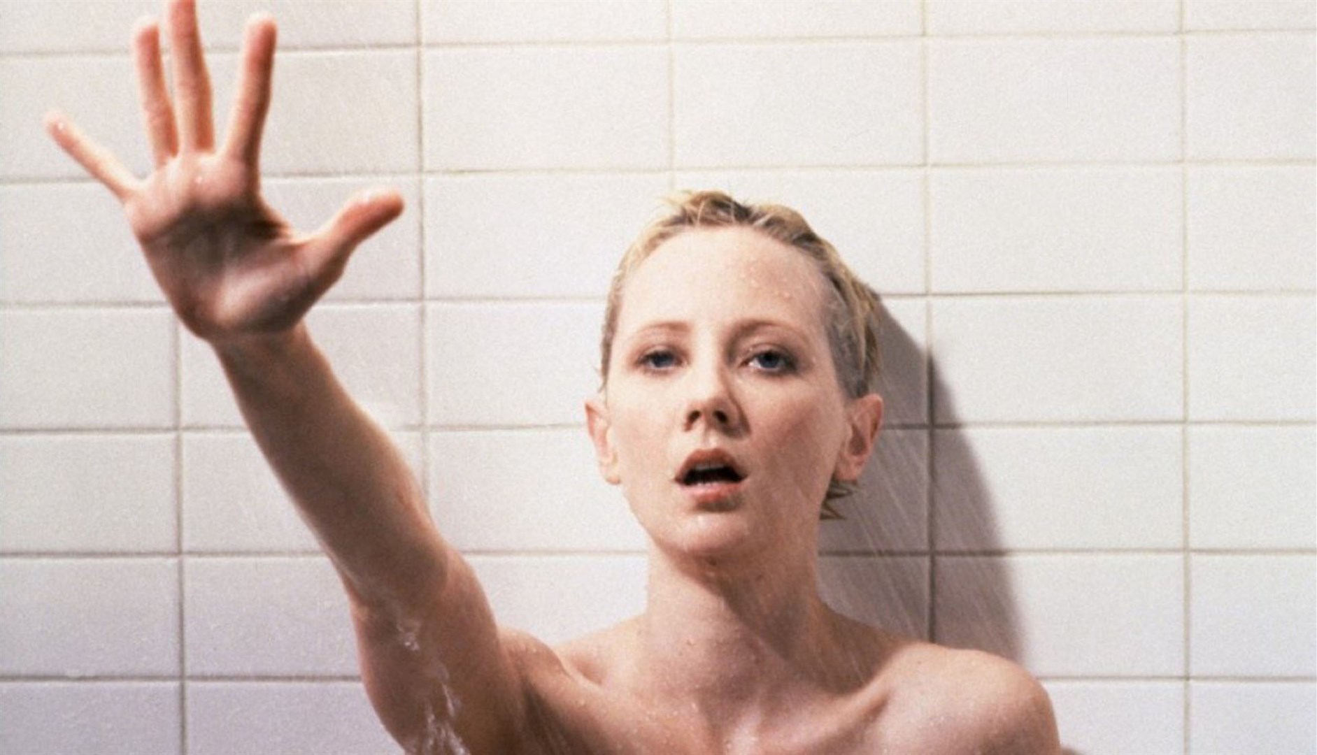Anne Heche as Marion Crane in the replication of the famous shower scene in Psycho (1998)