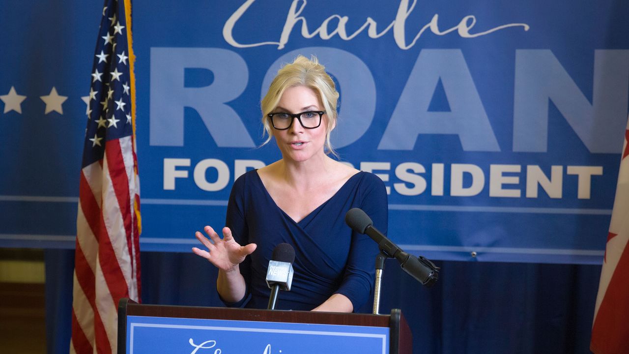 Elizabeth Mitchell as liberal presidential candidate Charlie Roan in The Purge: Election Year (2016)