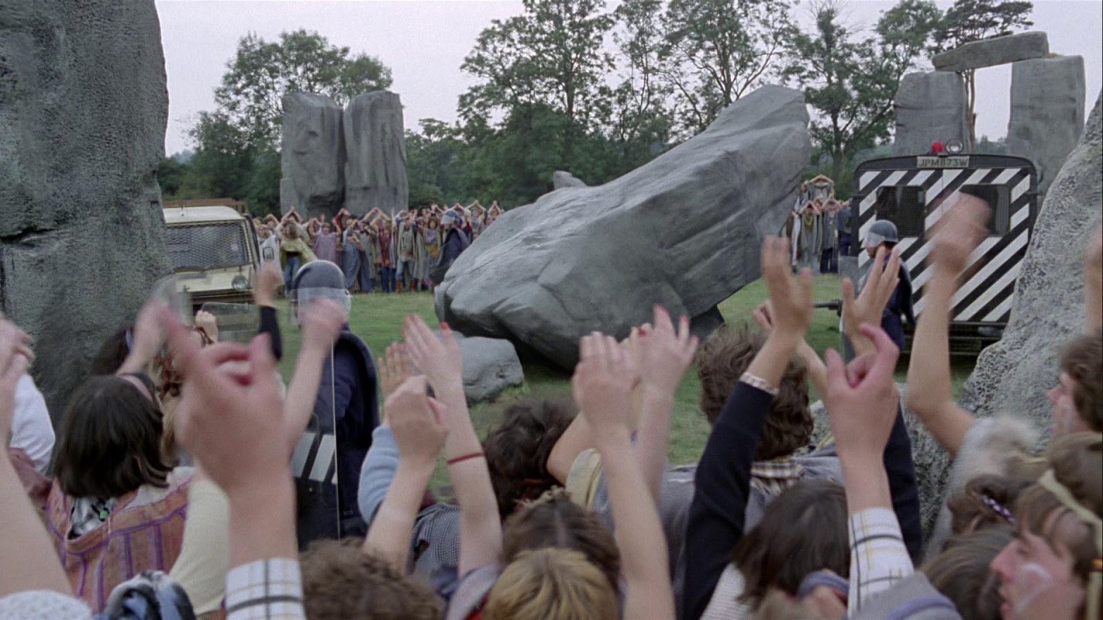The Planet People circle the megalithic site in Quatermass (1979)