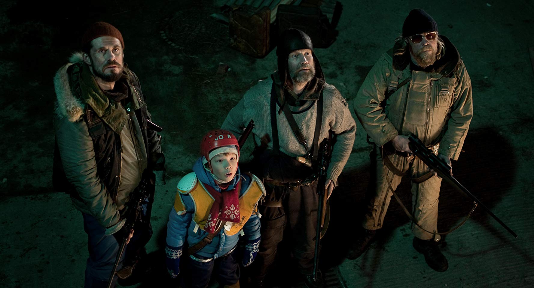 Tommi Korpela, Onni Tommila, Jorma Tommila, Rauno Juvonen deal with a rampaging Santa monster in Rare Exports (2010)