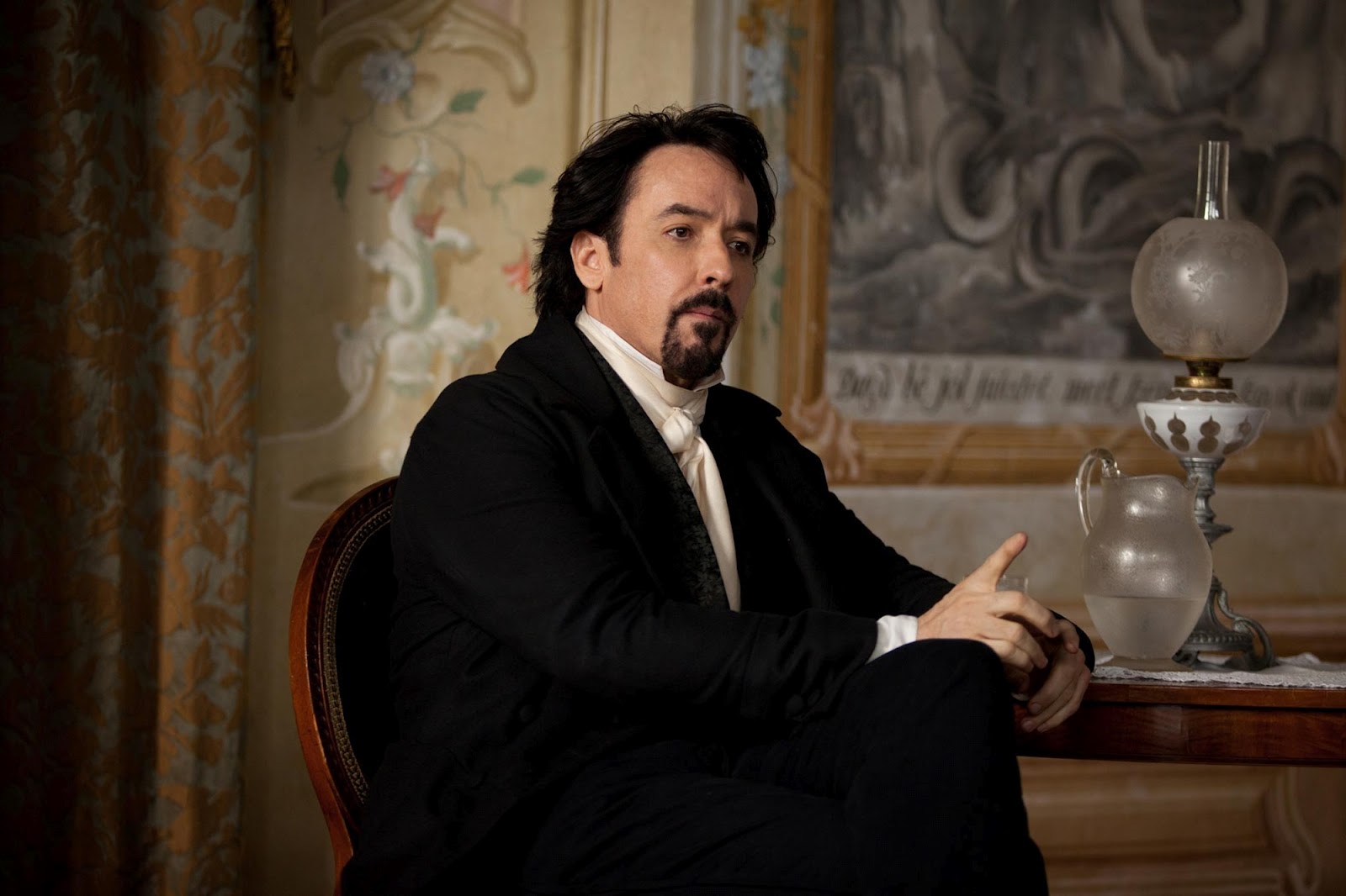 John Cusack as Edgar Allan Poe in The Raven (2012)