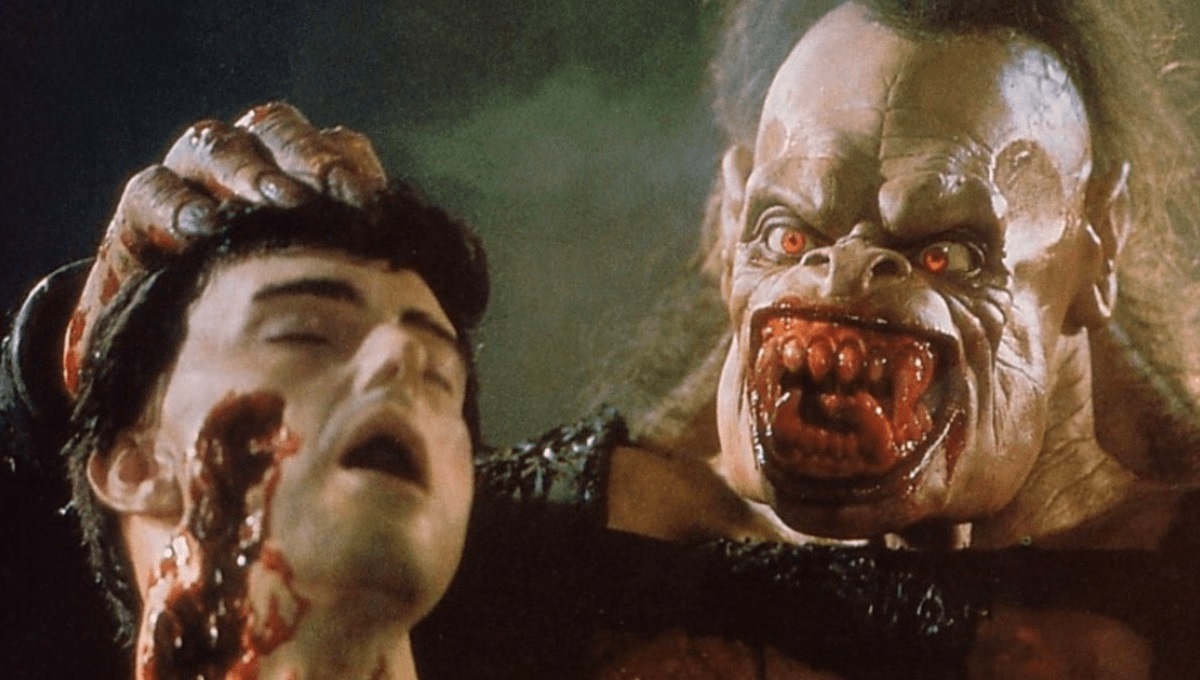 Rawhead Rex (Heinrich von Schellendorf) and friend's head in Rawhead Rex (1986)