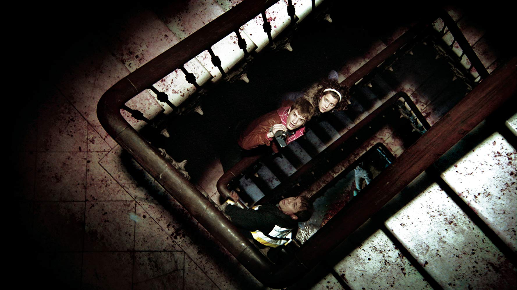 Survivors look for a way out - (top to bottom) Andrea Ros, Alex Battlori and Juli Fabregas in [Rec] 2 (2009)