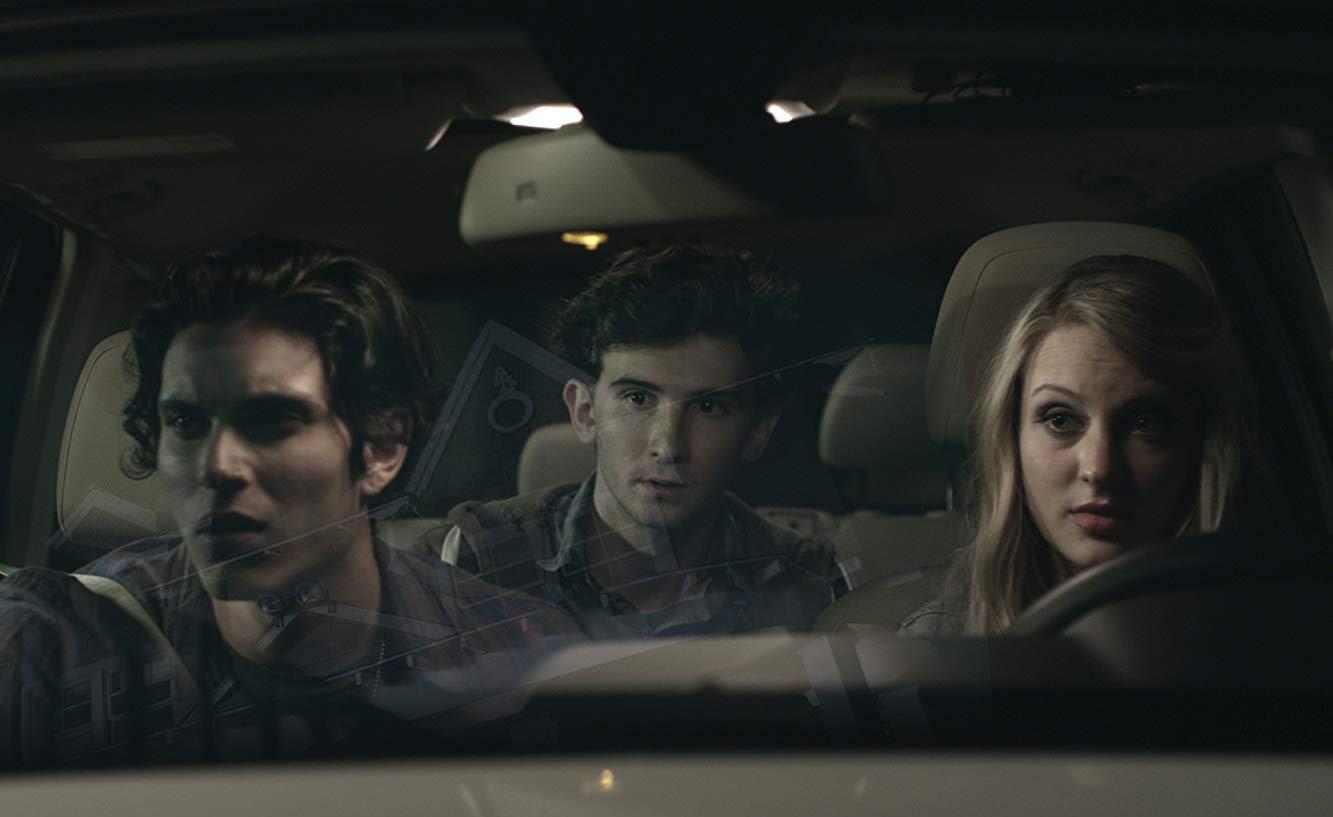 Kirby Bliss Blanton (r), younger brother Alex Shaffer (c) and date Samuel Larsen (l) set out to find her missing cellphone in Recovery (2016)