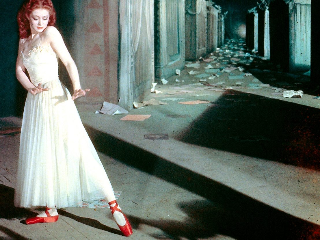 Moira Shearer wearing the red ballet shoes that take on a life of their own in The Red Shoes (1948)