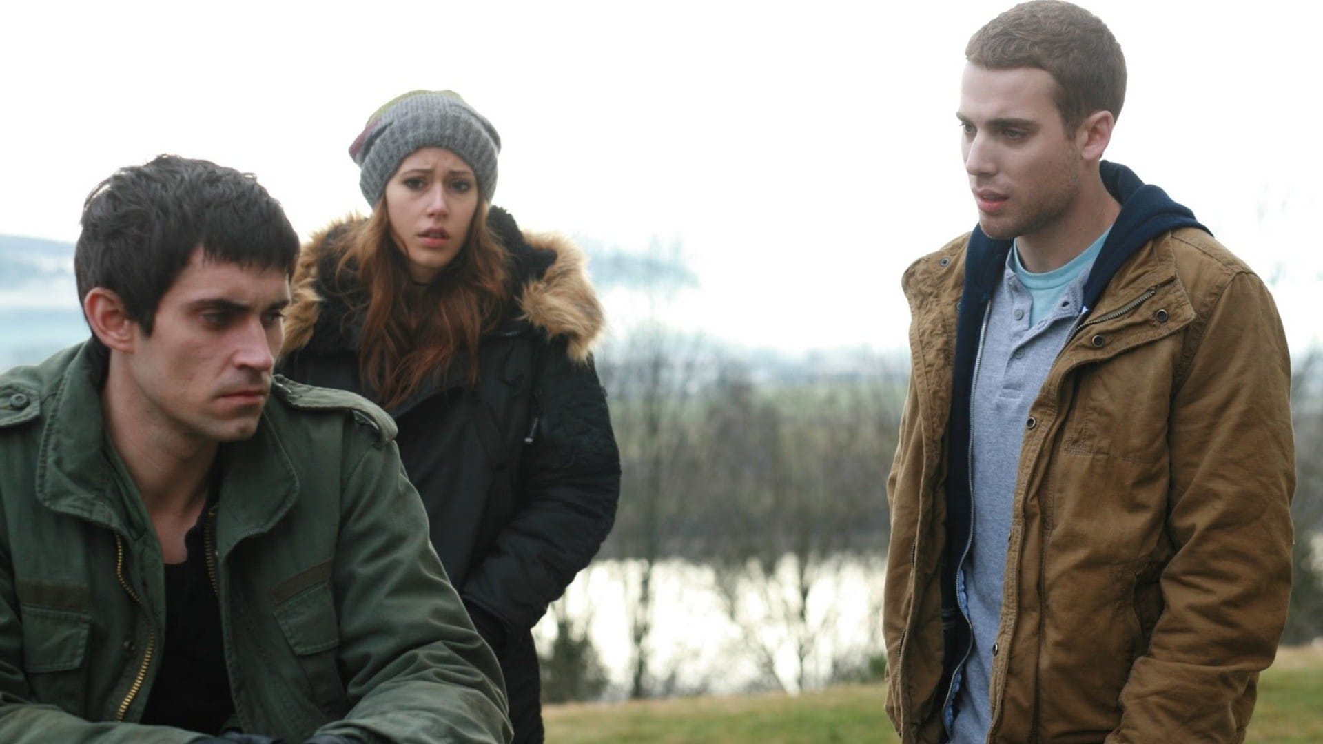 Three people caught in a timeloop - (l to r) Richard de Klerk, Amanda Crew and Dustin Milligan in Repeaters (2010)