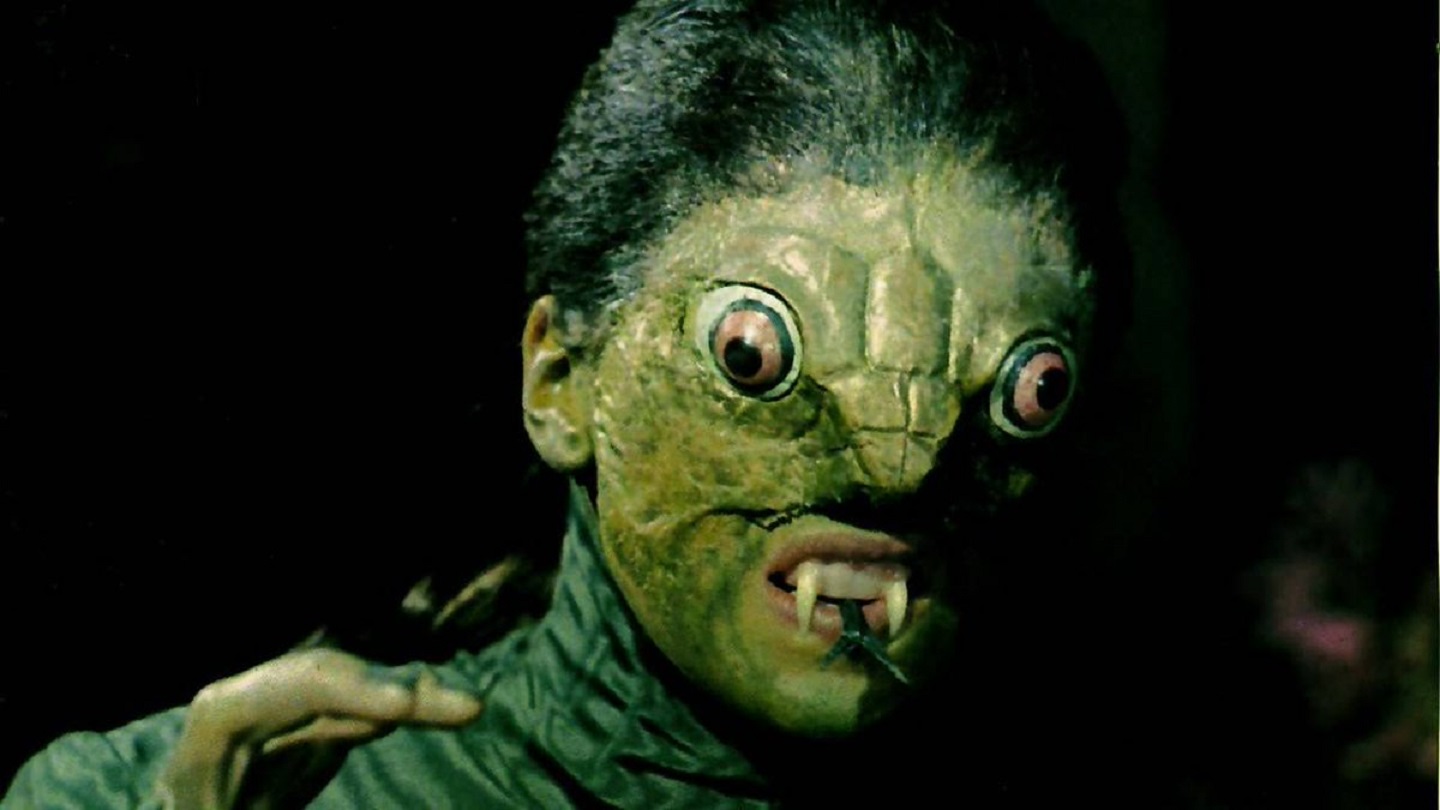 Jacqueline Pearce as The Reptile