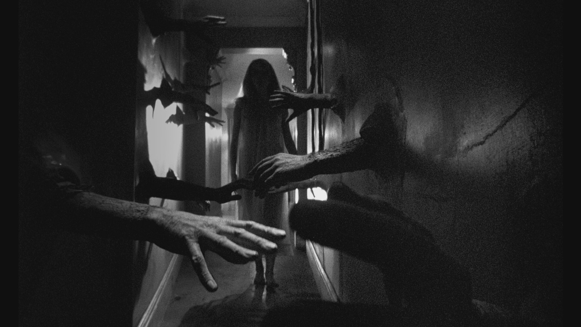 Catherine Deneuve and a wall of hands in Repulsion (1965)