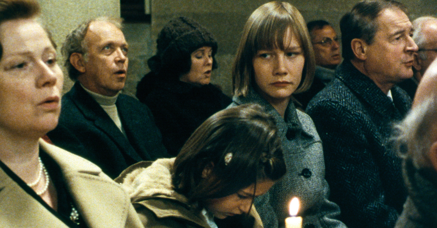 A troubled Sandra Hüller, as Michaela Klinger, the film's equivalent of Anneliese Michel, sits in church service in Requiem (2006)