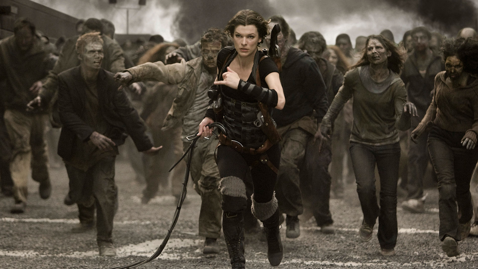 Alice (Milla Jovovich) flees zombies in Resident Evil: Afterlife (2010)