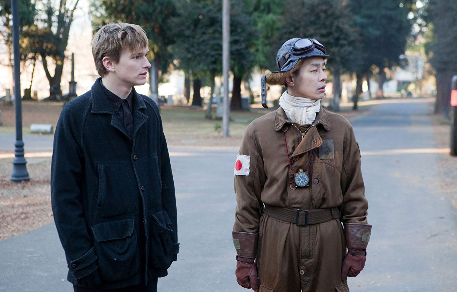 Henry Hopper and Ryo Kase as his ghostly companion, a Japanese kamikaze pilot from WWII in Restless (2011)