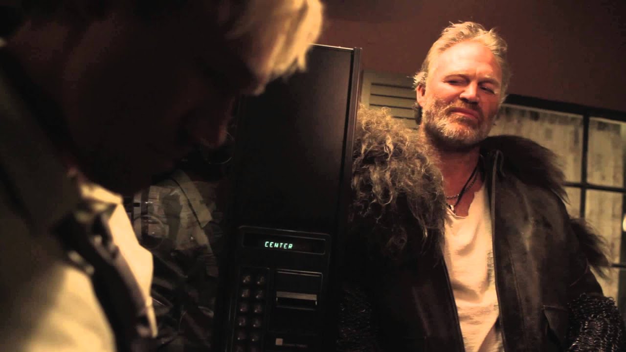 Josh McManus (David A.R. White) and biker gang leader Hawg (Brian Bosworth) in Revelation Road: The Sea of Glass and Fire (2013)