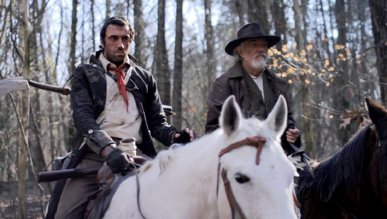 Zombie hunters - Preacher (Daniel Van Thomas) and Marshal Edwards (Daniel Britt) in Revelation Trail (2013)