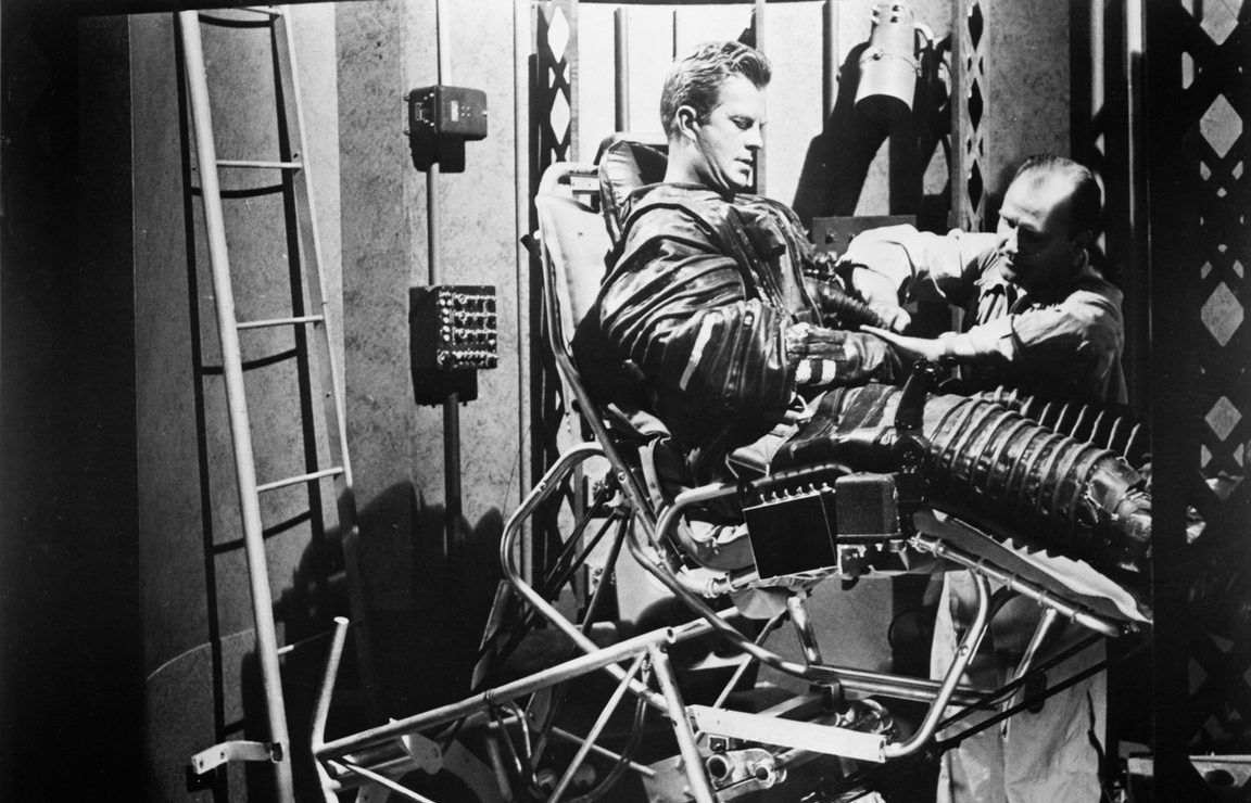 Richard Carlson prepares for a space launch in Riders to the Stars (1954)