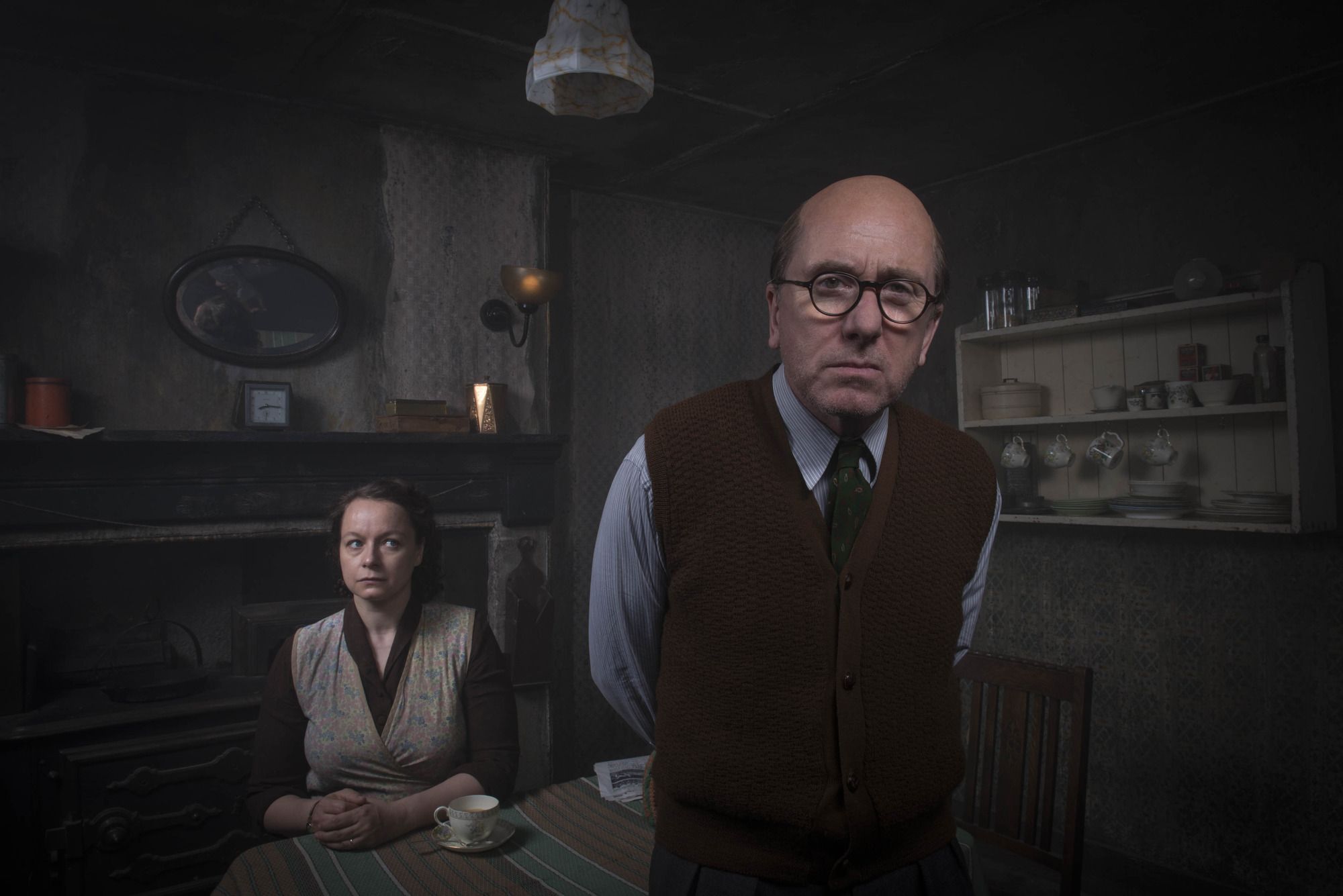 Tim Roth as serial killer Reginald Christie and with Samantha Morton as his wife Ethel in Rillington Place (2016)