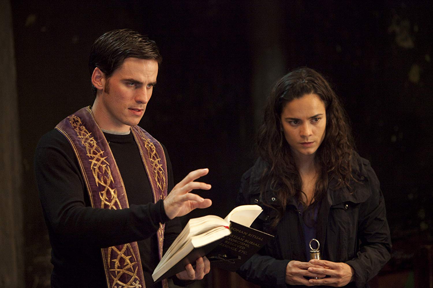 Colin O’Donoghue as novice priest Michael Kovak, along with journalist Alice Braga in The Rite (2011)