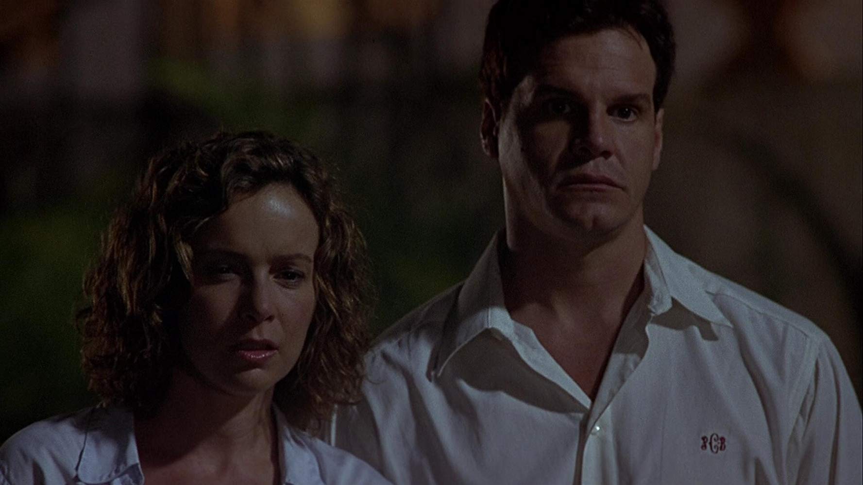 Jennifer Grey and Craig Sheffer face voodoo in Ritual (2002)