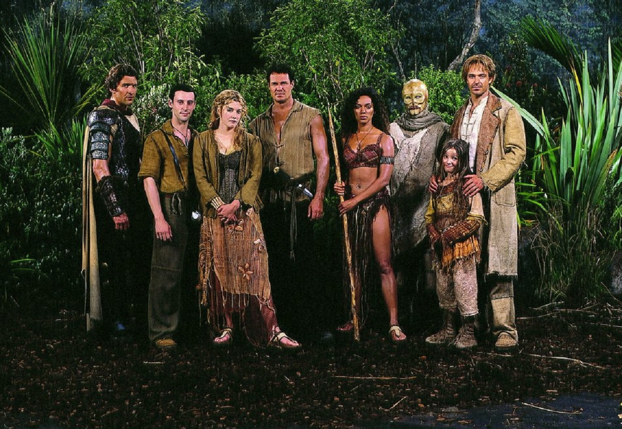 Character line-up - (l to r) Emperor Nero (Jonathan Cake), Lev Ruach (Jeremy Birchall), Alice Hargreaves (Emily Lloyd), Jeff Hale (Brad Johnson), Mali (Karen Holness), the alien Monat (Brian Moore), Gwenafra (Nikita Kearsley) and Samuel Clemens (Cameron Daddo) in Riverworld (2003)