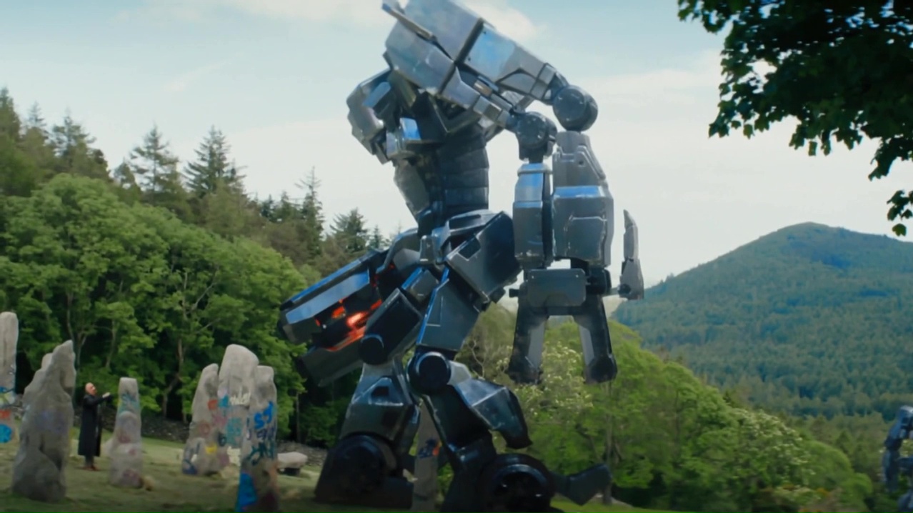 Ben Kingsley and robot overlord in Robot Overlords (2014)