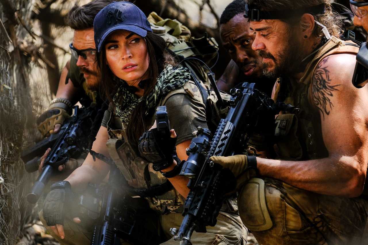 Mercenaries Grief Kriek, Megan Fox, Sisanda Henna and Brandon Auret in Rogue (2020)