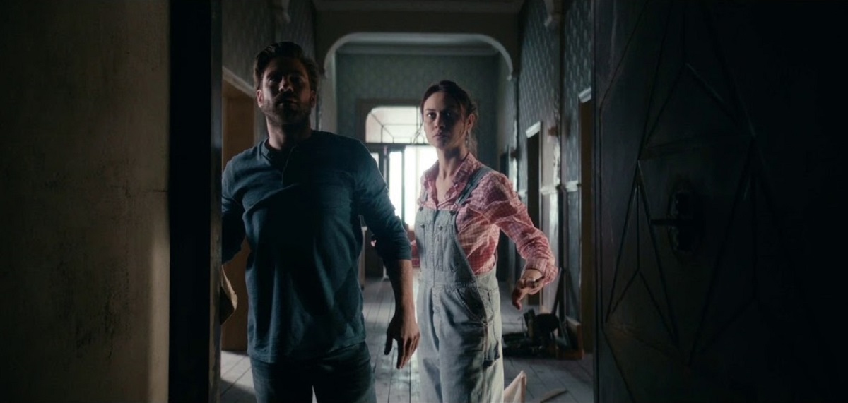 Kevin Janssens and Olga Kurylenko enter The Room (2019)