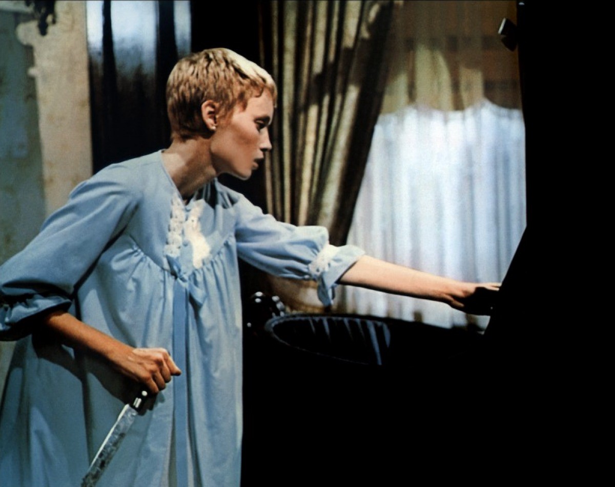 Rosemary (Mia Farrow) approaches the baby in Rosemary's Baby (1968)