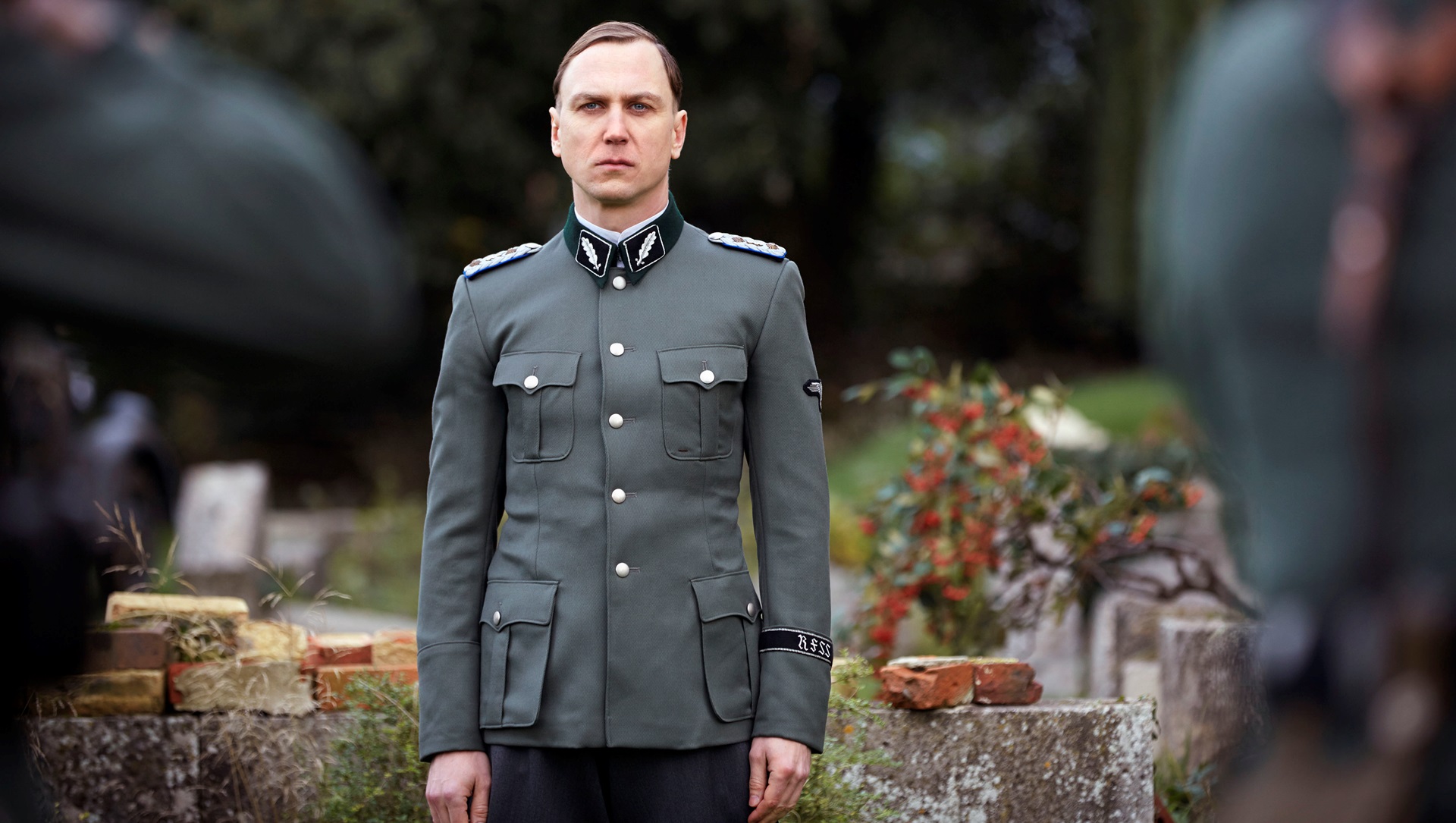 Lars Eidinger as Sturmbahnfuhrer Dr Oskar Huth in SS-GB (2017)