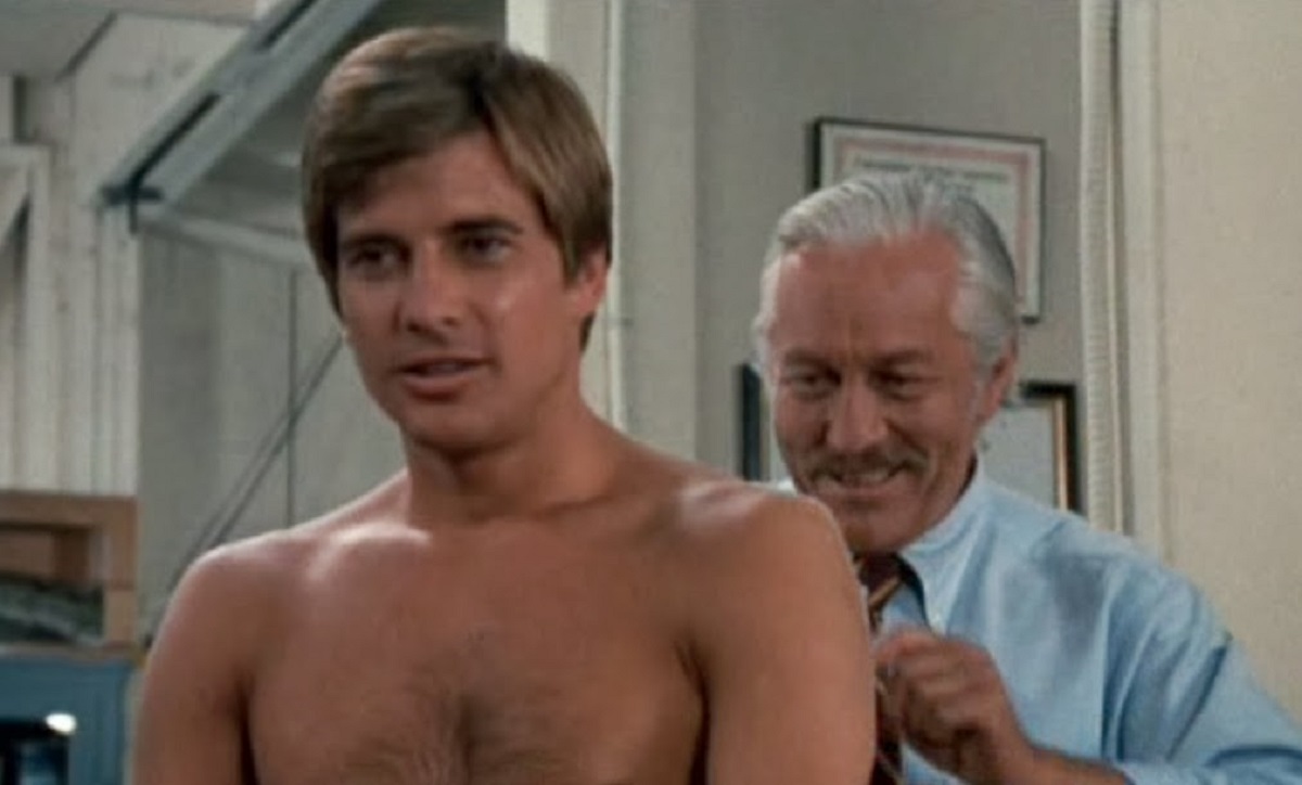 Scientist Strother Martin (r) turns Dirk Benedict (l) into a snake in SSSSSSSS! (1973)