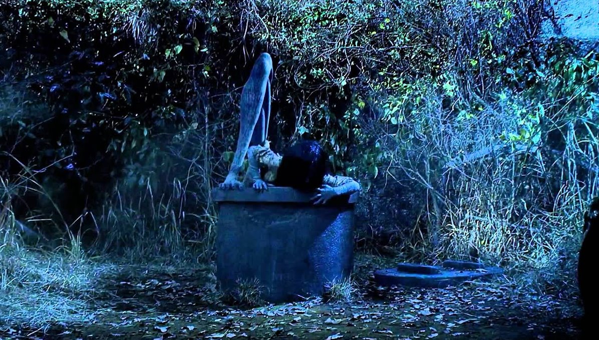 A 3D CGi Sadako emerges from the well in Sadako 3D (2012)