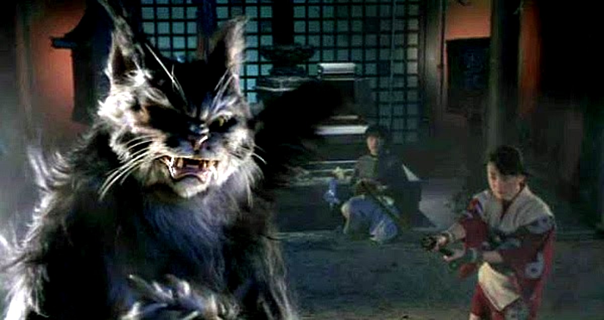 Sakuya (Nozomi Ando) and Taro (Shuichi Yamauchi) vs the cat demon in Sakuya, The Slayer of Demons (2000)
