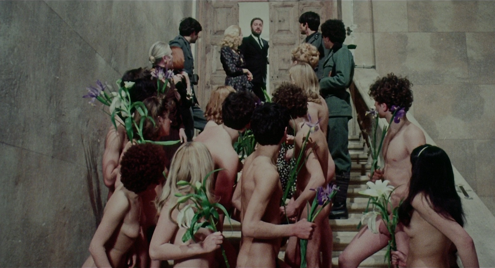 The libertines invite the youths into their villa in Salo or 120 Days of Sodom (1975)