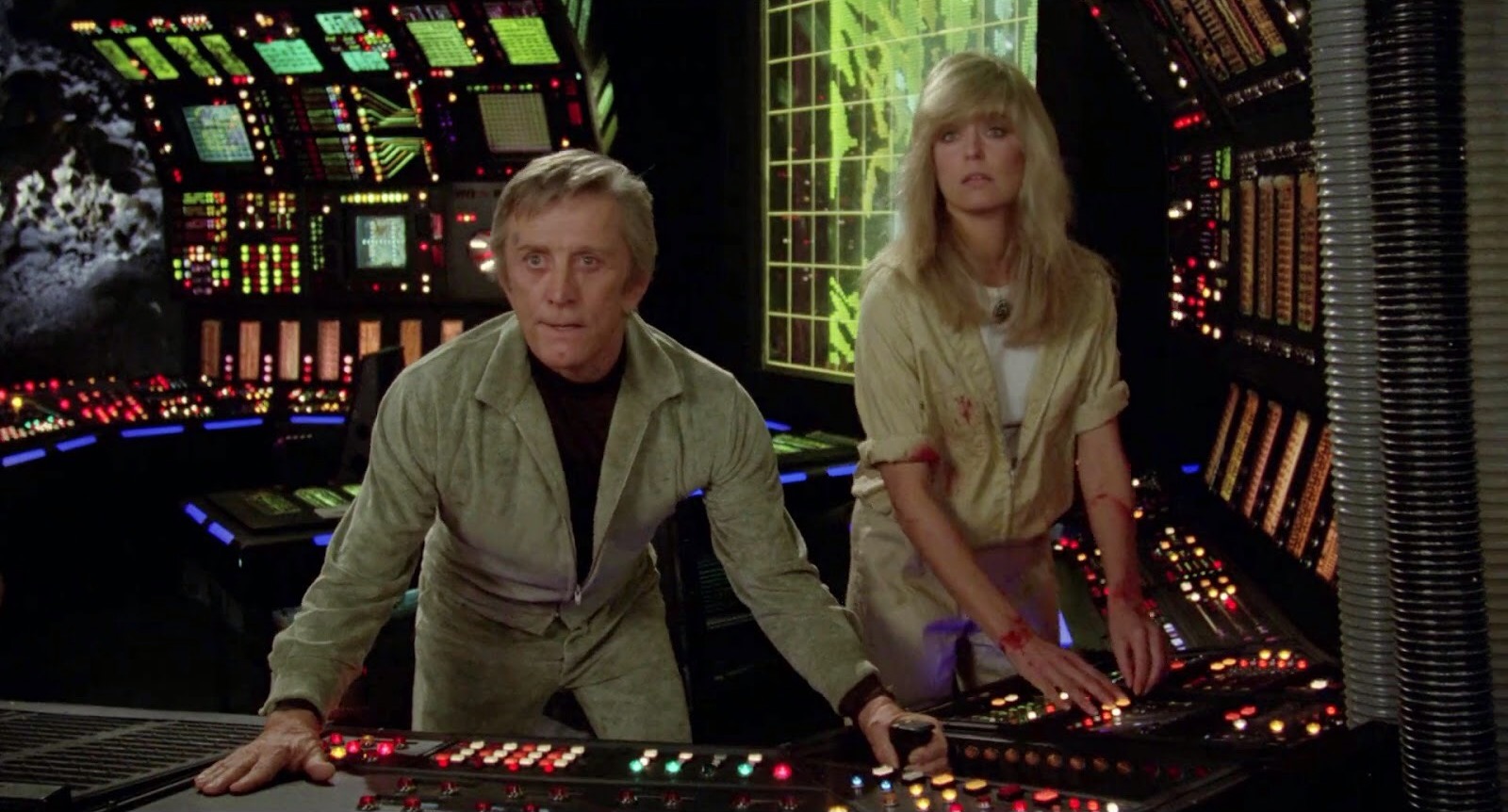 Adam (Kirk Douglas) and Alex (Farrah Fawcett) - lovers manning a station on Saturn’s moon Triton in Saturn 3 (1980)