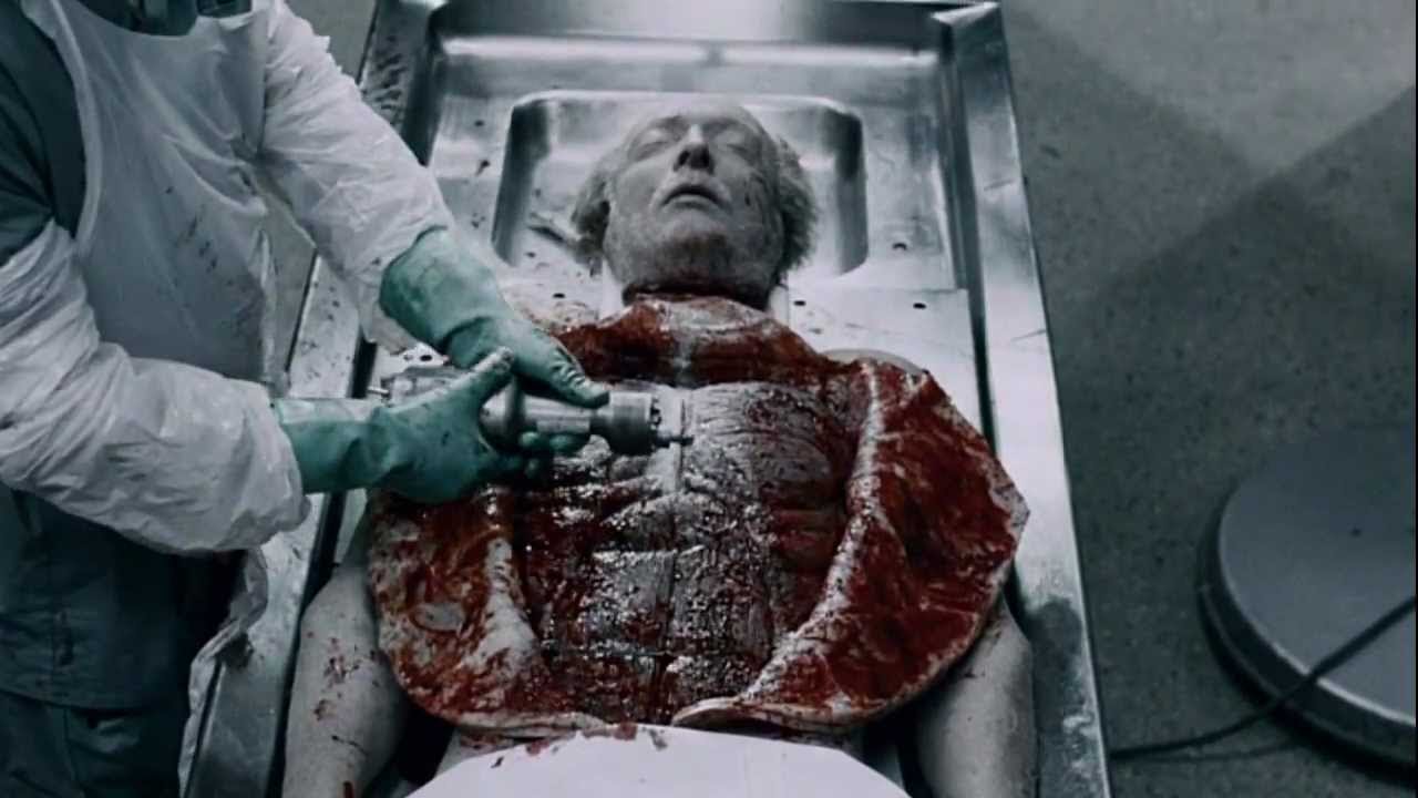 Jigsaw (Tobin Bell)'s autopsy with no anatomical detail spared in Saw IV (2007)