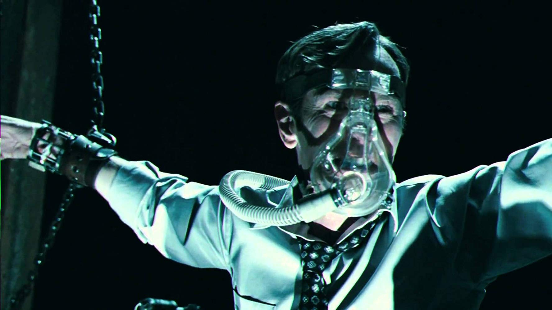Peter Outerbridge tortured in Saw VI (2009)