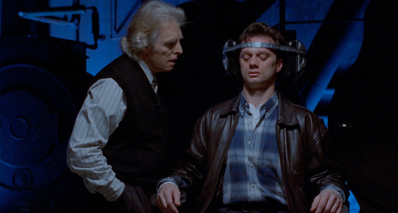 Dr Karl Glock (Richard lynch) and Samuel Staziak (Daniel Quinn) in Scanner Cop (1994)