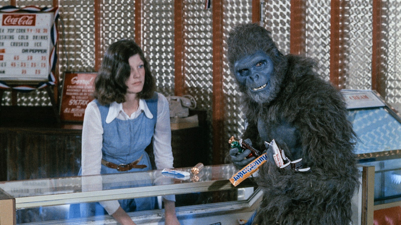 The Schlockthropus (John Landis) goes to the movies in Schlock (1973)