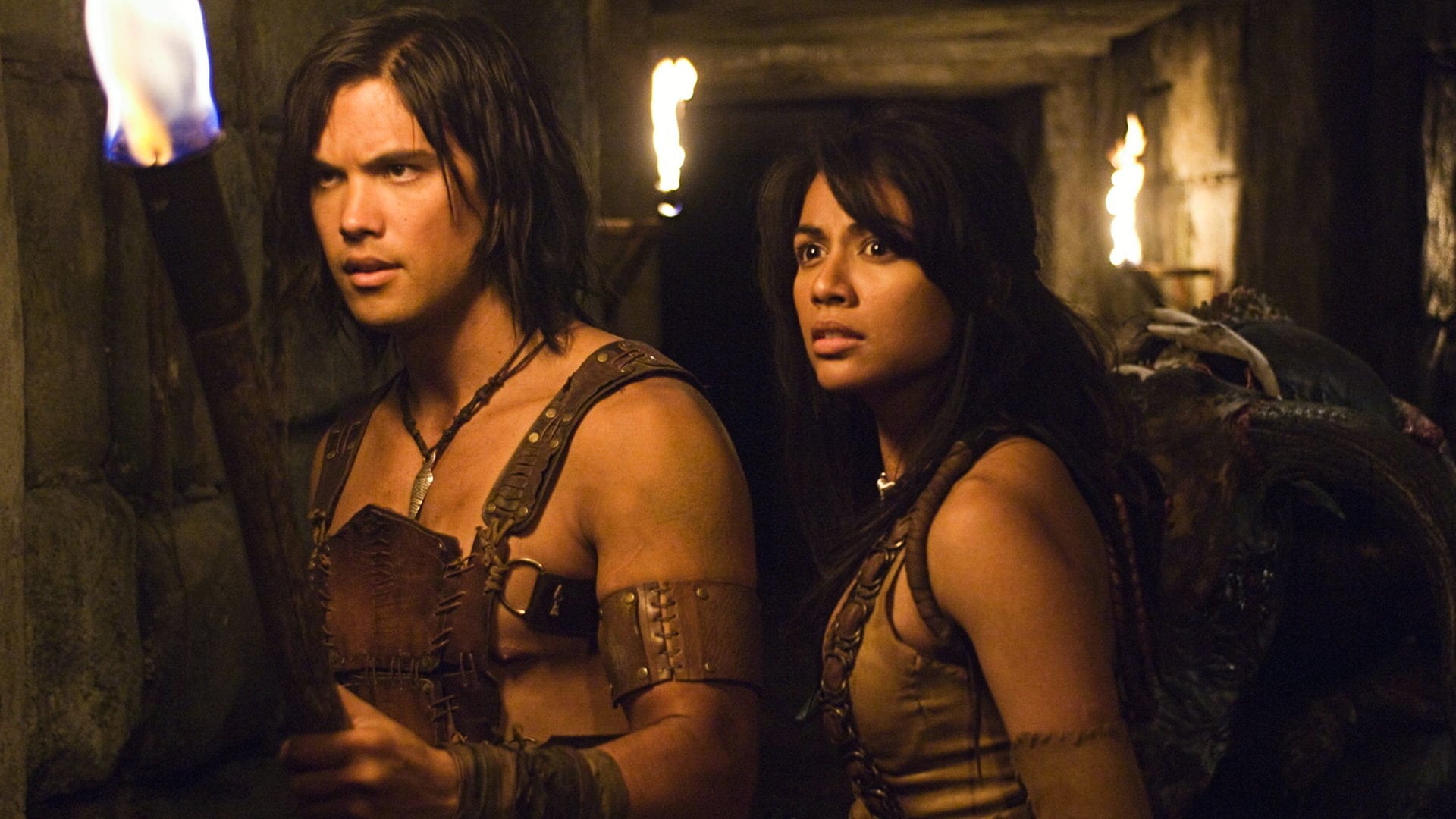 Michael Copon as the young Mathayus along with his childhood love Layla (Karen David) enter The Labyrinth in The Scorpion King: Rise of a Warrior (2008)