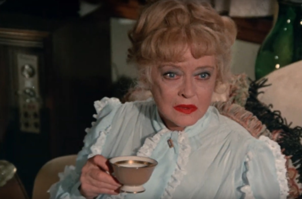 Bette Davis as Mrs. Elliot in Scream Pretty Peggy (1973)