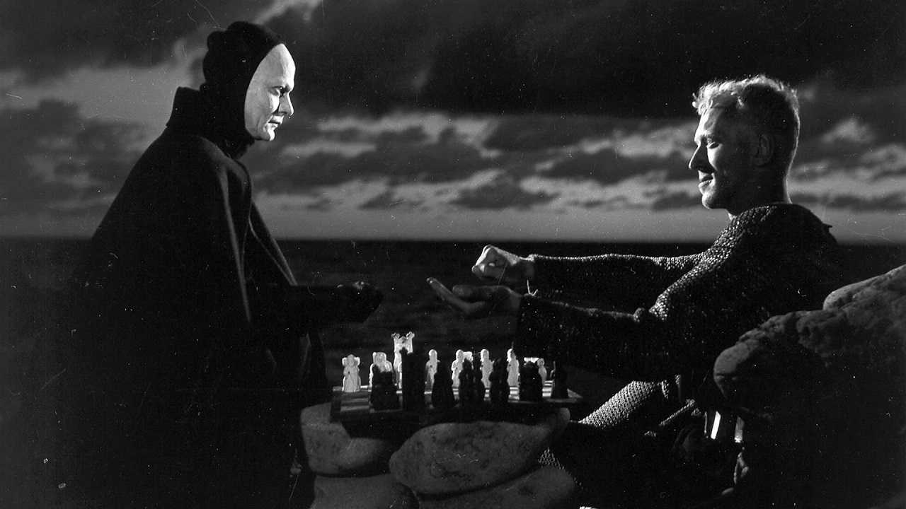 Death (Bengt Ekerot) and the knight Antonius Block (Max Von Sydow) sit down to play a game of chess in The Seventh Seal (1957)