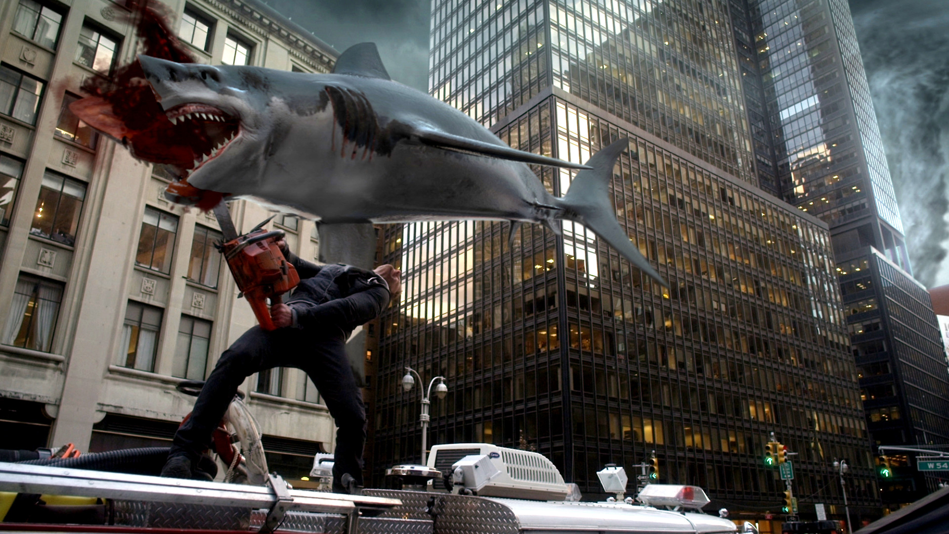 Ian Ziering and chainsaw vs shark in the streets of New York City in Sharknado 2 The Second One (2014)